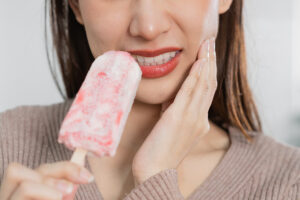 Sensitive Tooth Treatment by the Dentist on the Gold Coast